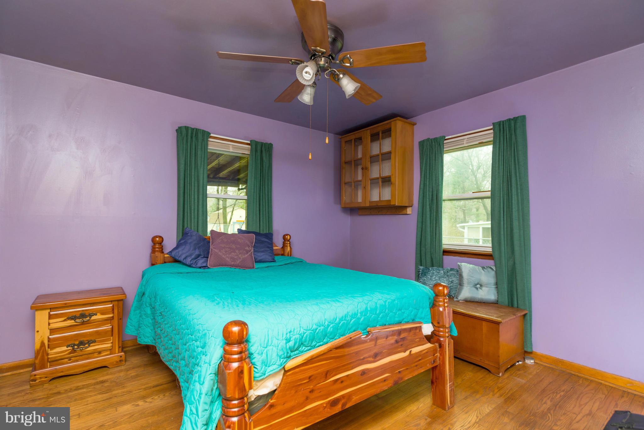 46 Carroll Road Pasadena, MD 21122 - Photo 12 of 18 a bed room with a bed and a window