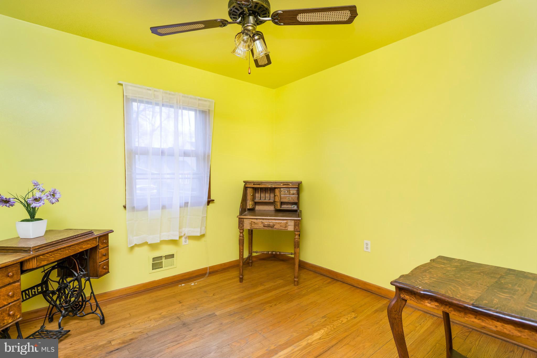 46 Carroll Road Pasadena, MD 21122 - Photo 15 of 18 a view of a dining room with a table and chairs