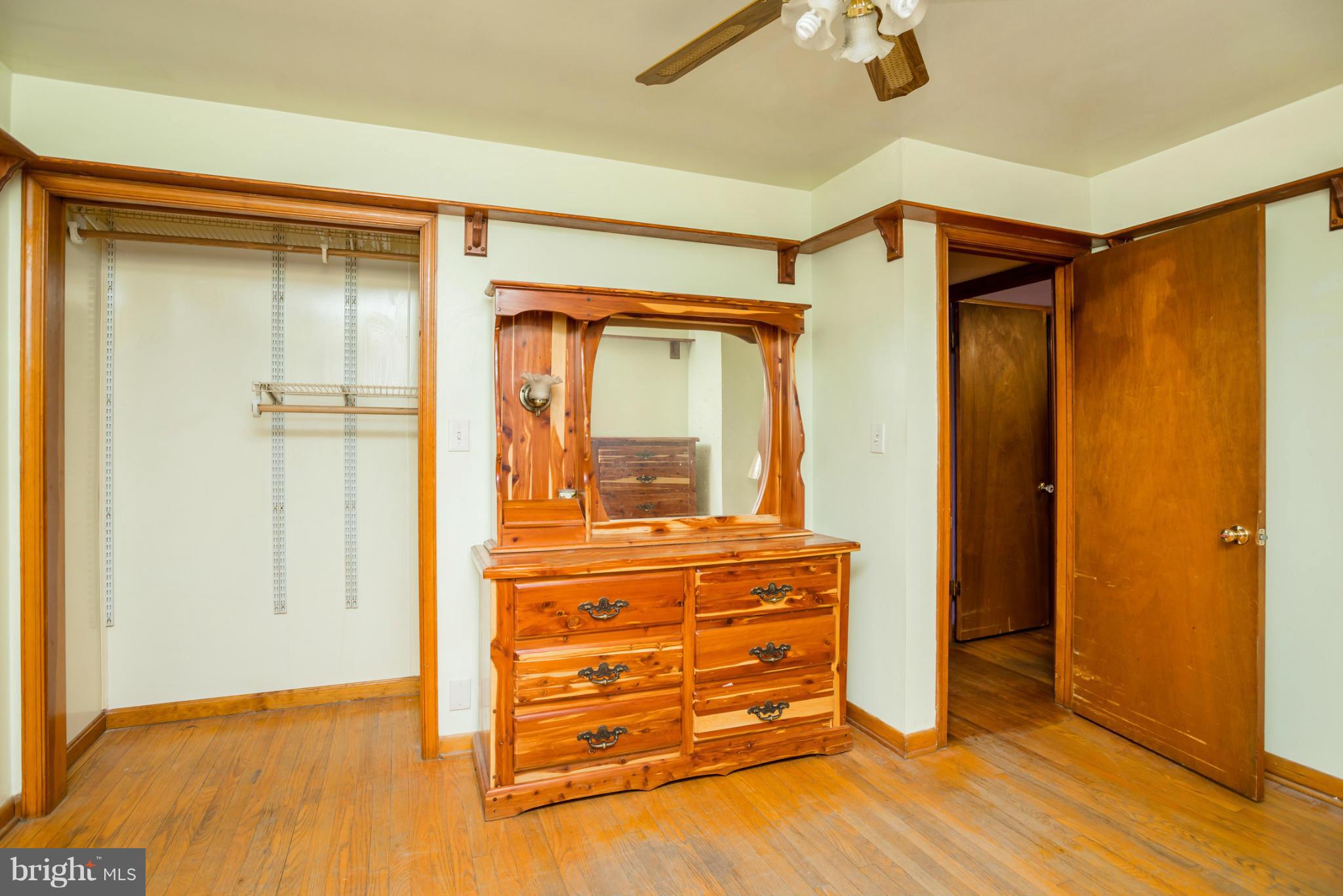 46 Carroll Road Pasadena, MD 21122 - Photo 18 of 18 wooden floor and closet in a room