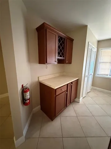 a view of empty room with windows