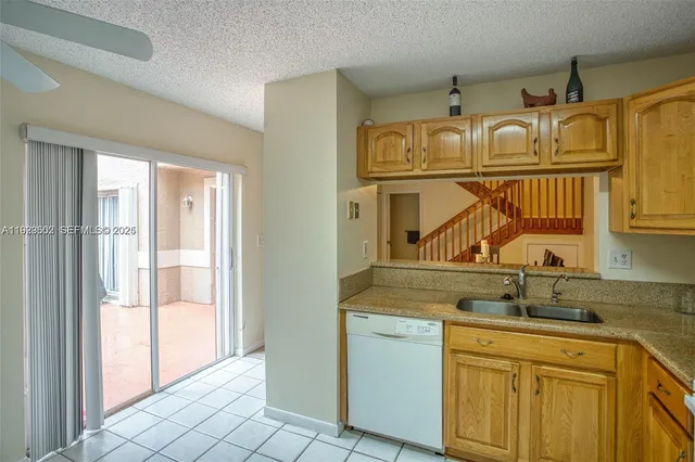 a view of sink and mirror