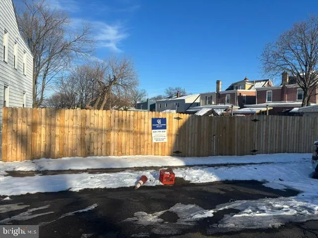 a view of a backyard of the house