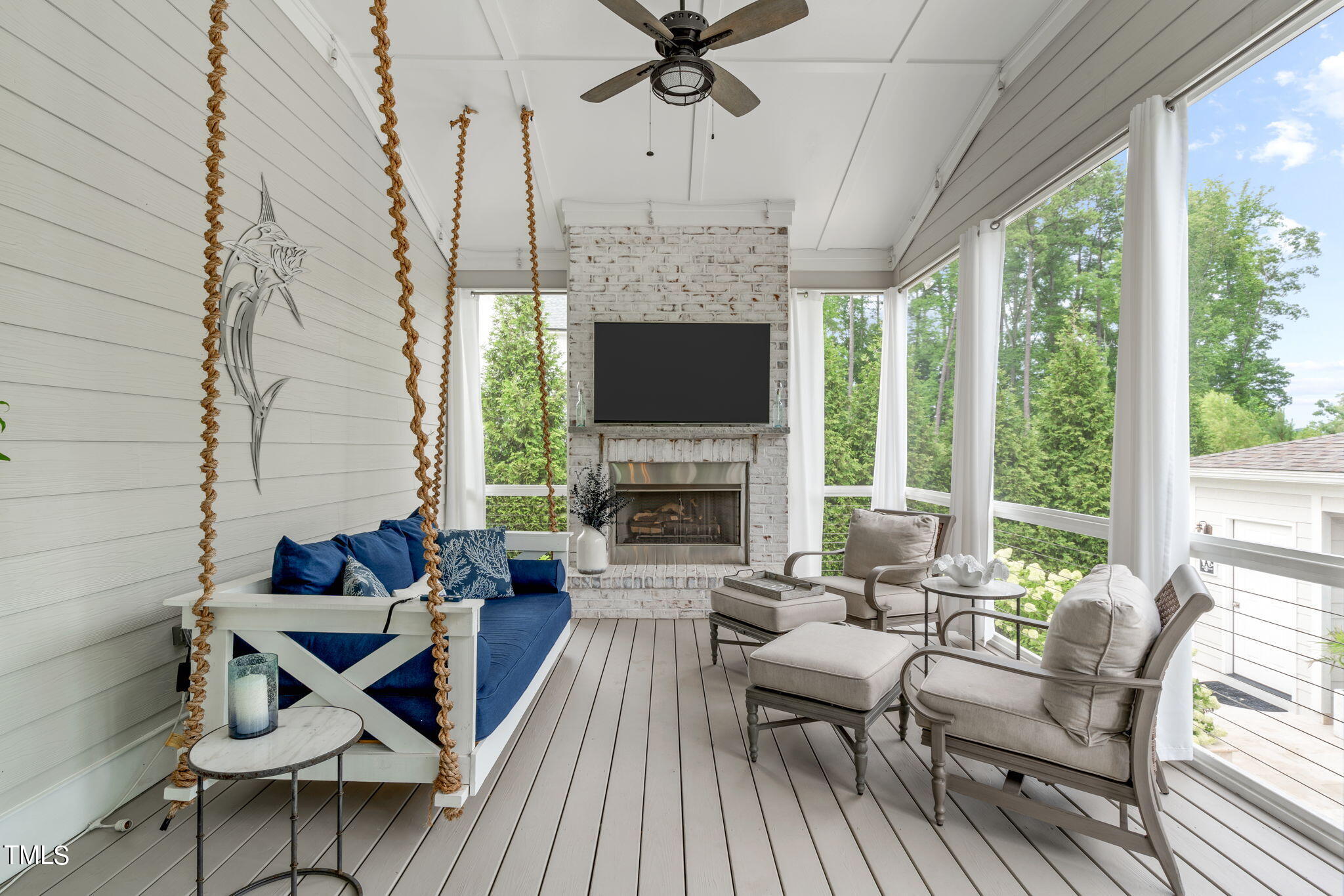 3130 Mantle Ridge Drive Apex, NC 27502 - Photo 25 of 81 a living room with furniture and a fireplace