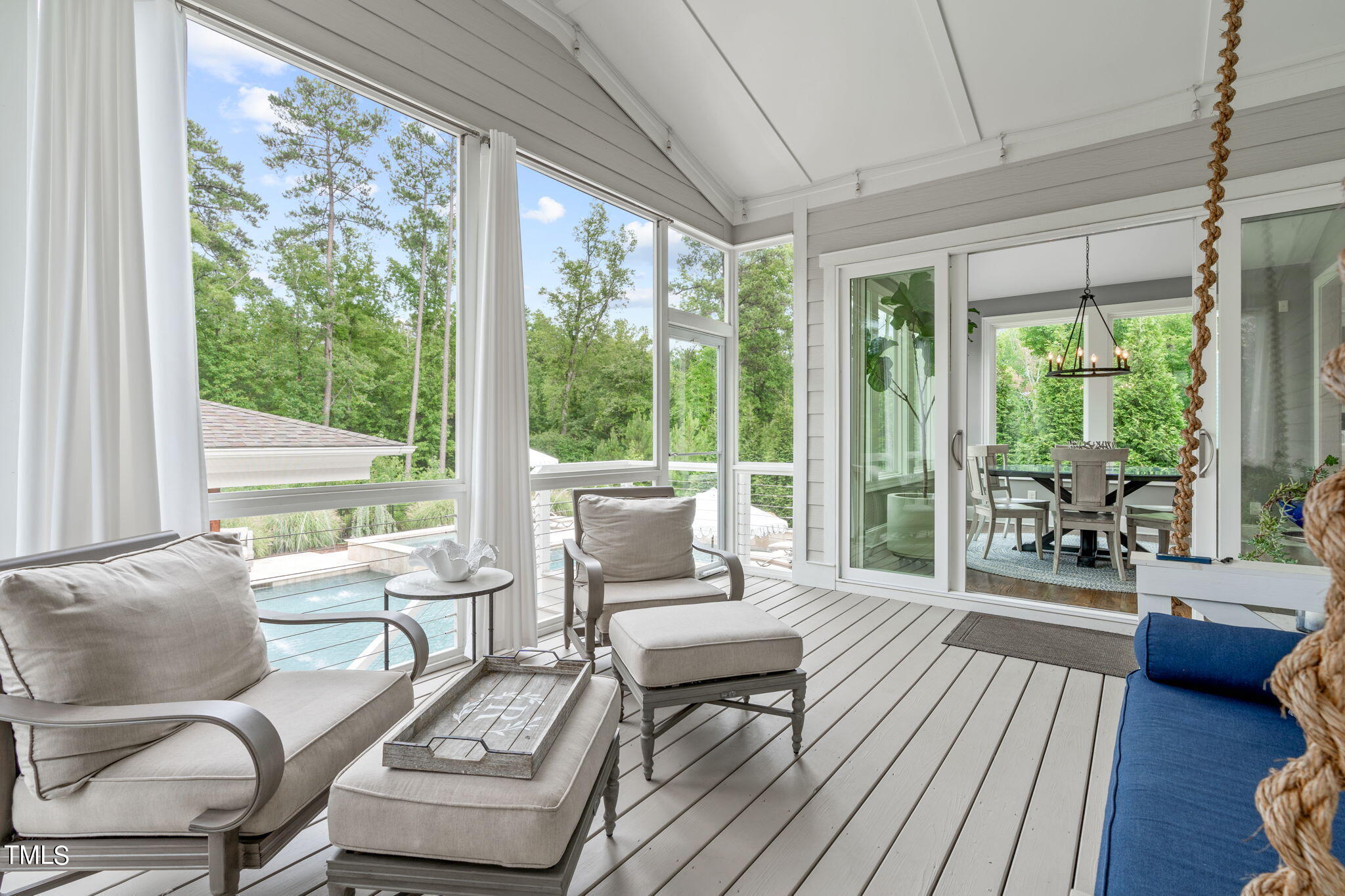3130 Mantle Ridge Drive Apex, NC 27502 - Photo 26 of 81 a living room with furniture and a wooden floor