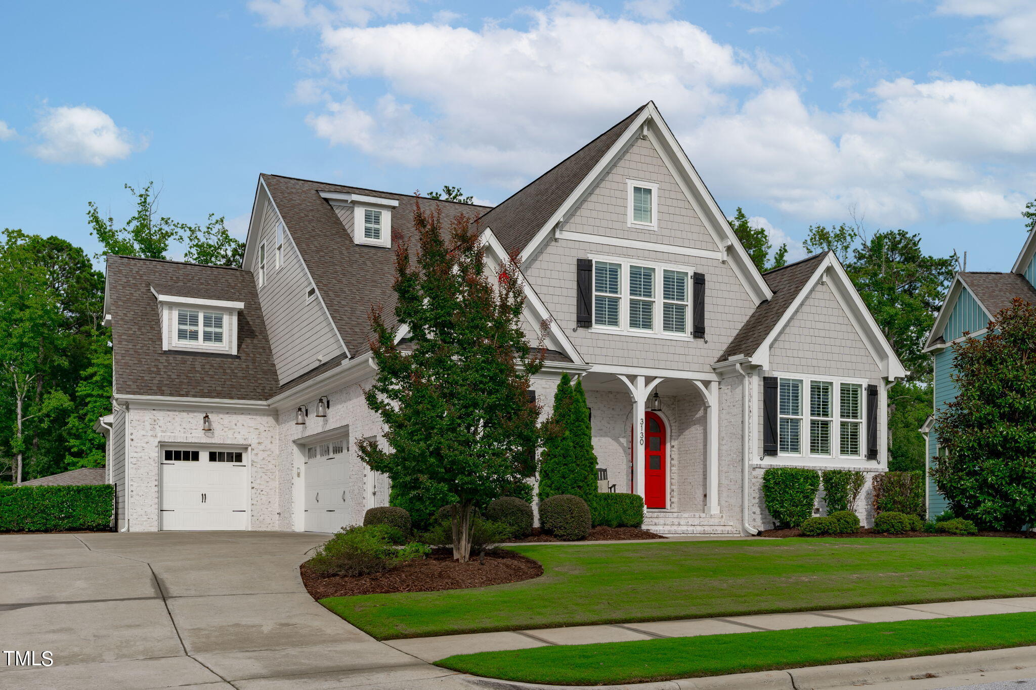 3130 Mantle Ridge Drive Apex, NC 27502 - Photo 3 of 81 a front view of a house with a yard