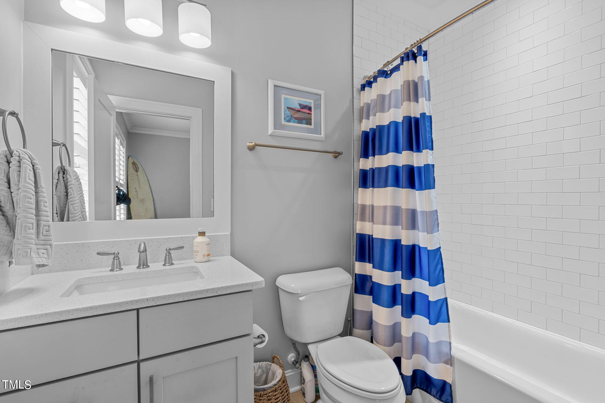 3130 Mantle Ridge Drive Apex, NC 27502 - Photo 39 of 81 a bathroom with a sink toilet and shower