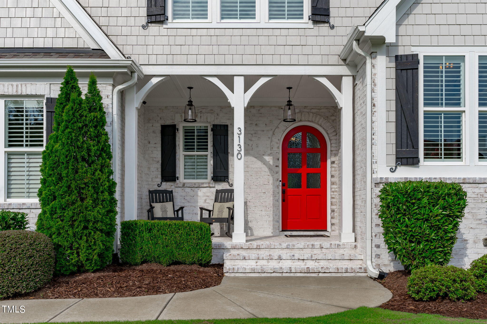 3130 Mantle Ridge Drive Apex, NC 27502 - Photo 4 of 81 a view of front door and small houses