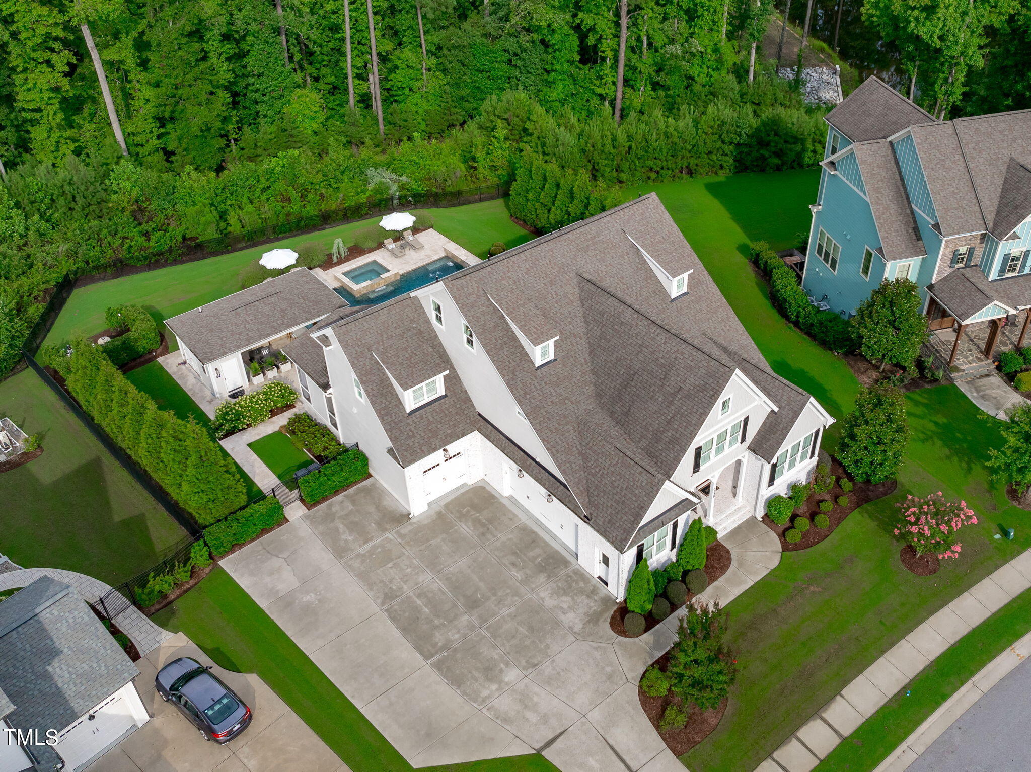 3130 Mantle Ridge Drive Apex, NC 27502 - Photo 53 of 81 an aerial view of a house with garden space and street view