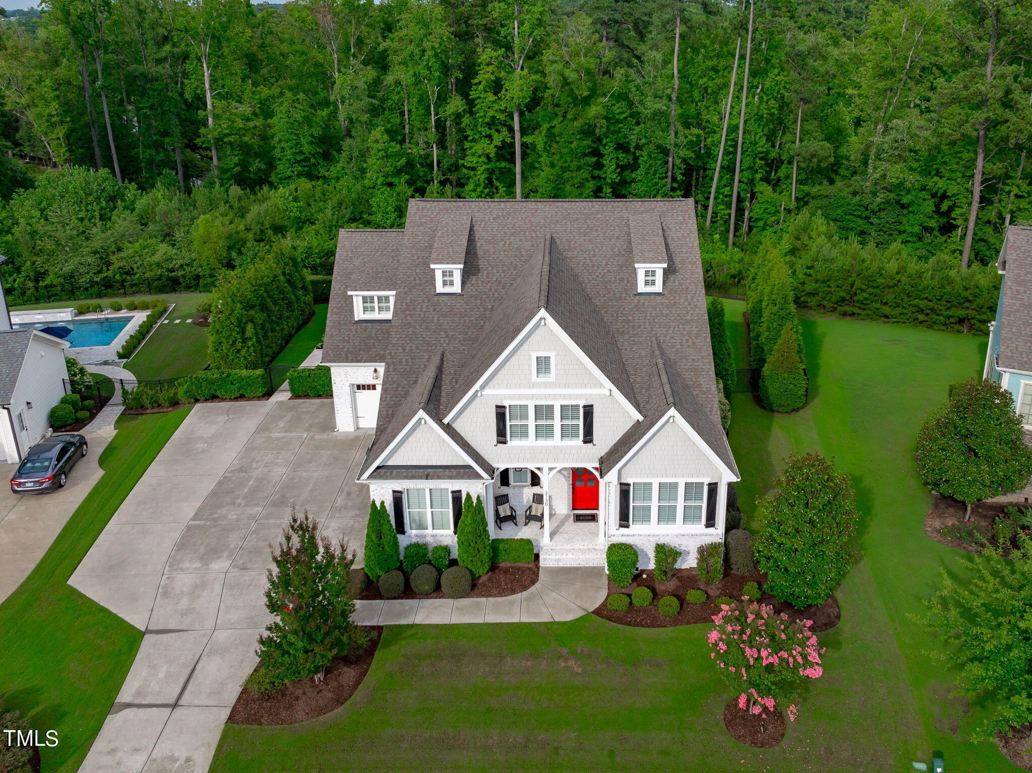 3130 Mantle Ridge Drive Apex, NC 27502 - Photo 55 of 81 an aerial view of a house with a big yard and potted plants