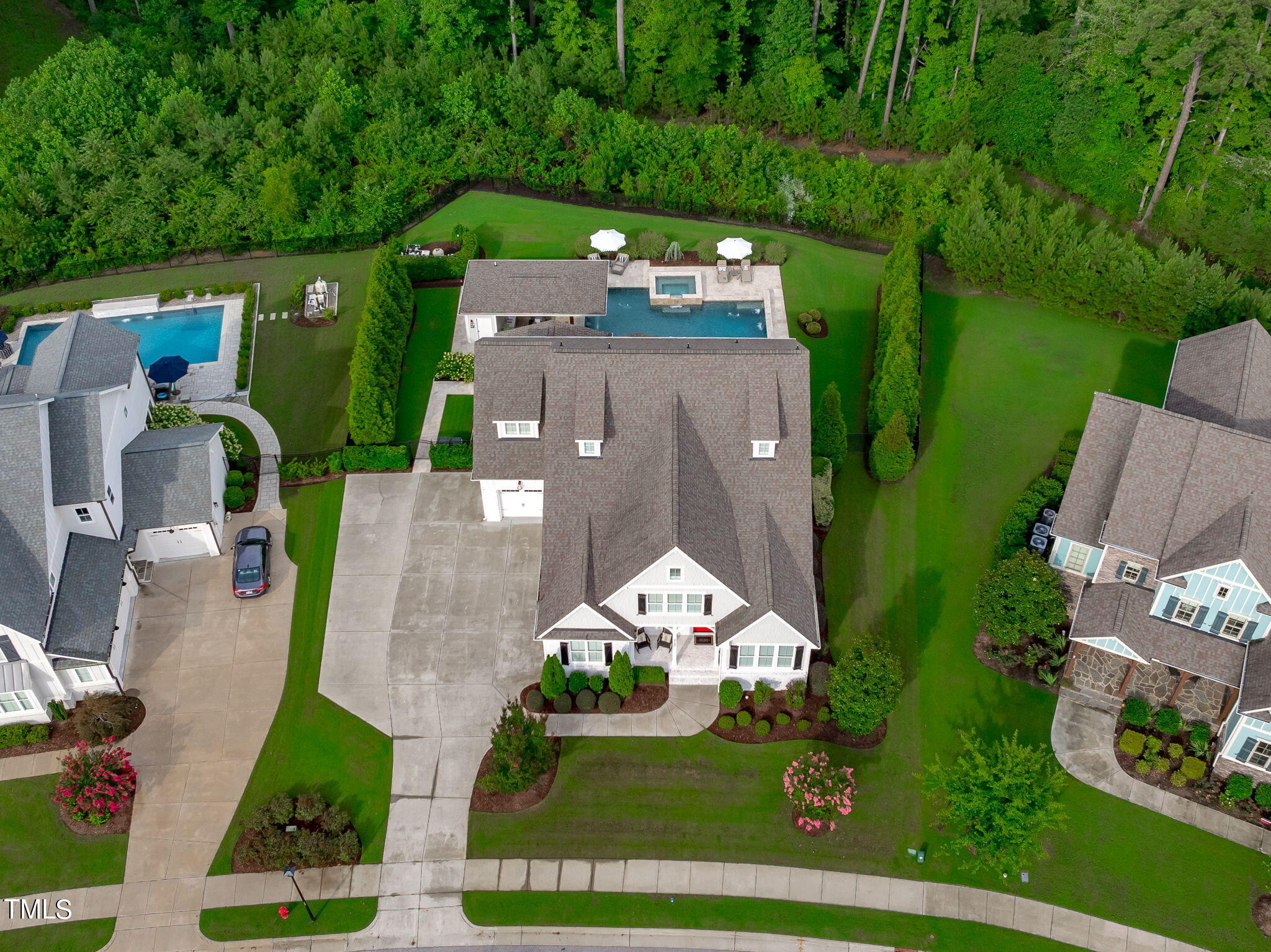 3130 Mantle Ridge Drive Apex, NC 27502 - Photo 56 of 81 an aerial view of a house with a garden