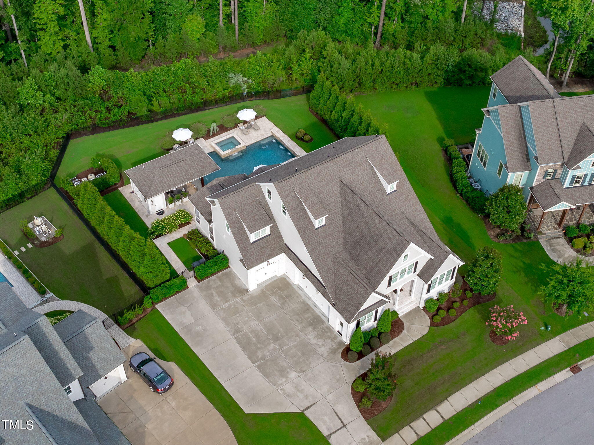 3130 Mantle Ridge Drive Apex, NC 27502 - Photo 58 of 81 an aerial view of a house with a garden