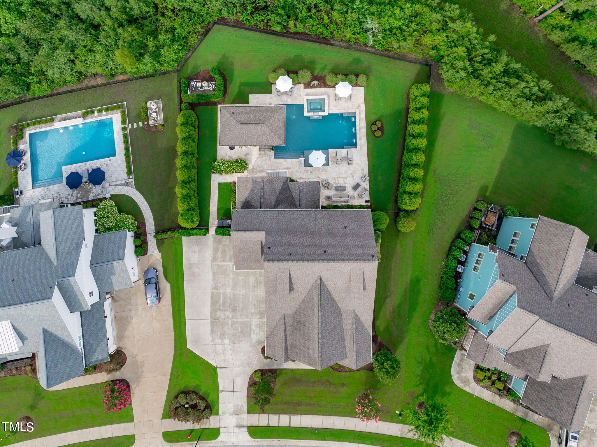3130 Mantle Ridge Drive Apex, NC 27502 - Photo 59 of 81 an aerial view of a house with outdoor space pool seating area and yard