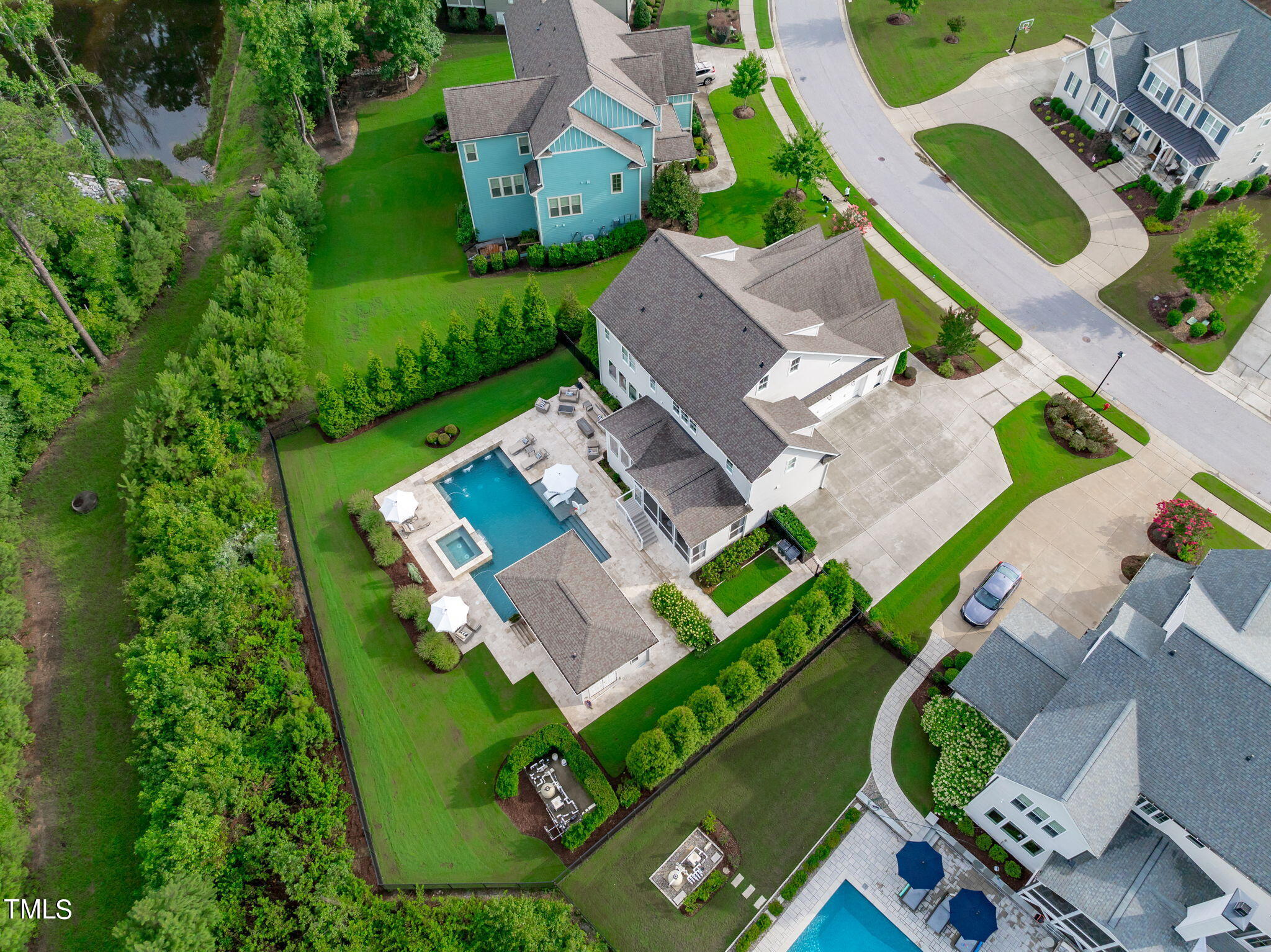 3130 Mantle Ridge Drive Apex, NC 27502 - Photo 62 of 81 an aerial view of a house with a garden