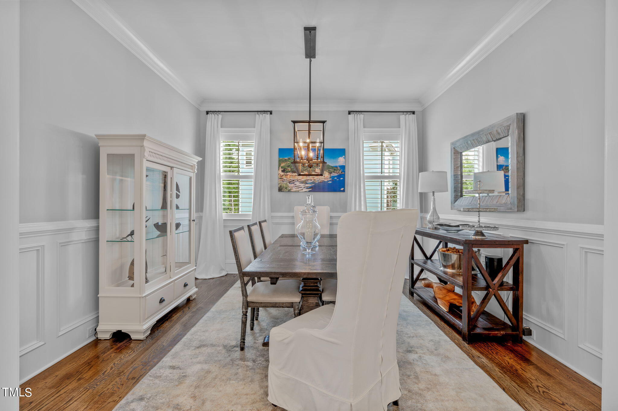3130 Mantle Ridge Drive Apex, NC 27502 - Photo 8 of 81 a view of a dining room with furniture and a window