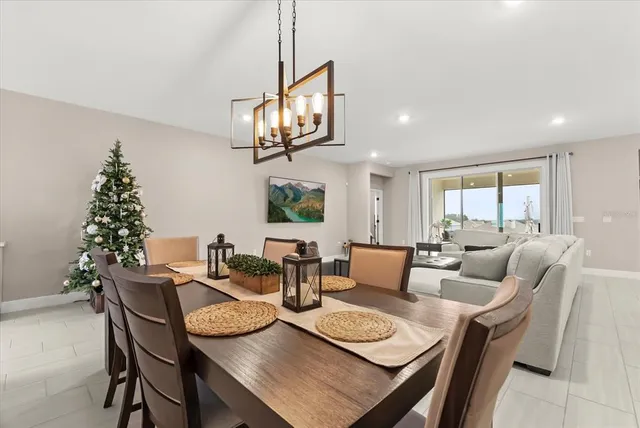 a bedroom with a bed next to a window