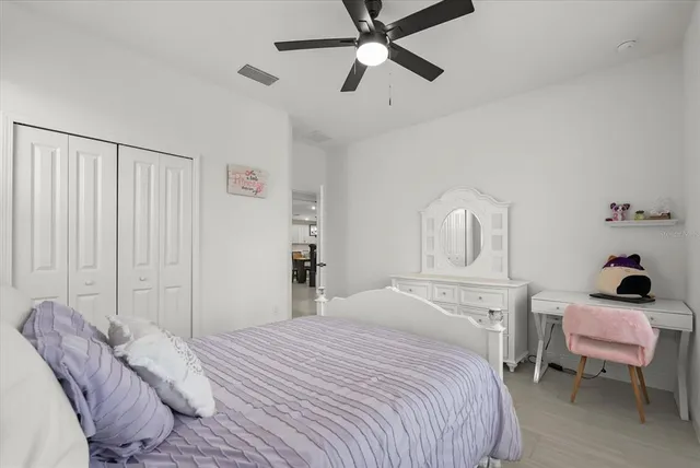a view of a workspace with furniture and gym equipment