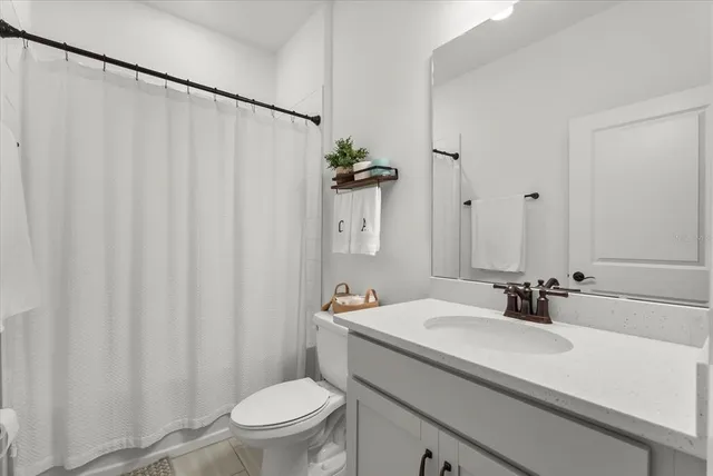 a reading room with furniture and large window