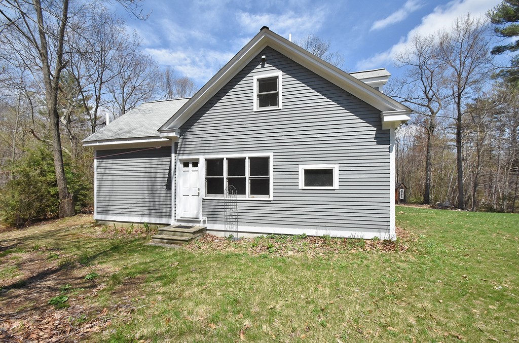 537 Fitchburg State Road Ashby, MA 01431 - Photo 1 of 17 a front view of a house with yard