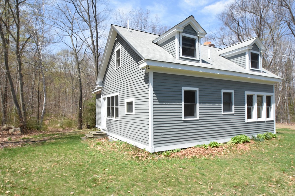 537 Fitchburg State Road Ashby, MA 01431 - Photo 15 of 17 a view of a house with a yard