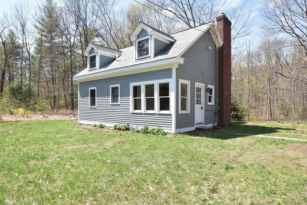 537 Fitchburg State Road Ashby, MA 01431 - Photo 16 of 17 a house view with a garden space
