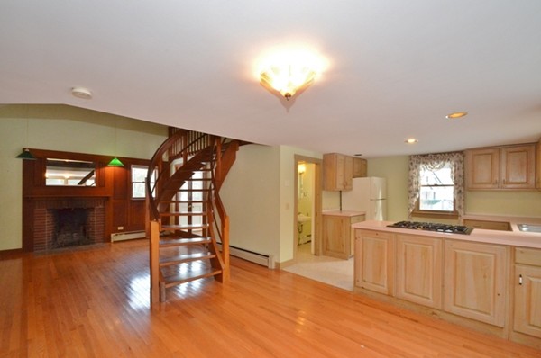 537 Fitchburg State Road Ashby, MA 01431 - Photo 4 of 17 a view of a kitchen with furniture and wooden floor