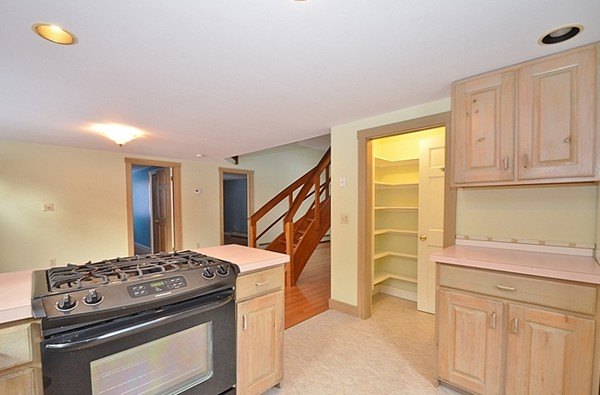 537 Fitchburg State Road Ashby, MA 01431 - Photo 6 of 17 a kitchen with a stove and a cabinet