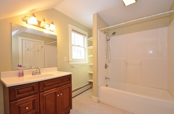 537 Fitchburg State Road Ashby, MA 01431 - Photo 9 of 17 a bathroom with a tub sink shower and mirror