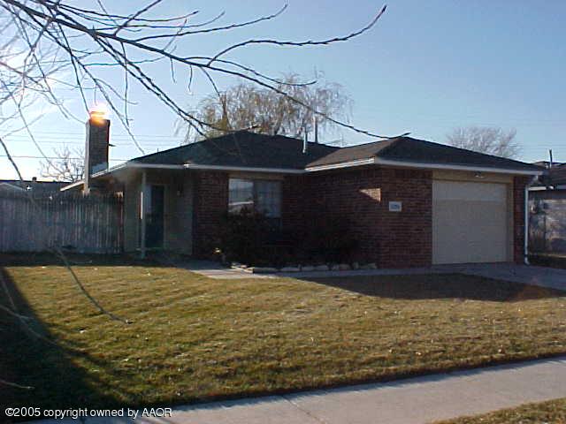 5204 Capulin Lane Amarillo, TX 79110 - Photo 1 of 10 a front view of house with yard