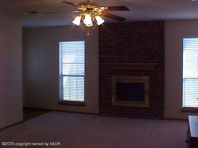 5204 Capulin Lane Amarillo, TX 79110 - Photo 2 of 10 a view of a livingroom with a fireplace