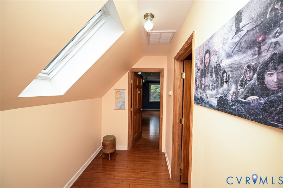 6040 Hare Road Henrico, VA 23231 - Photo 34 of 54 Hardwood flooring, recessed lighting, and a skylig