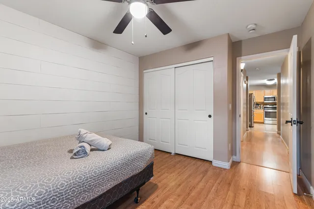 a view of a livingroom and wooden floor