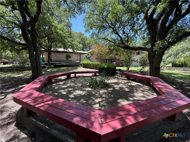 a front view of a house with a pathway
