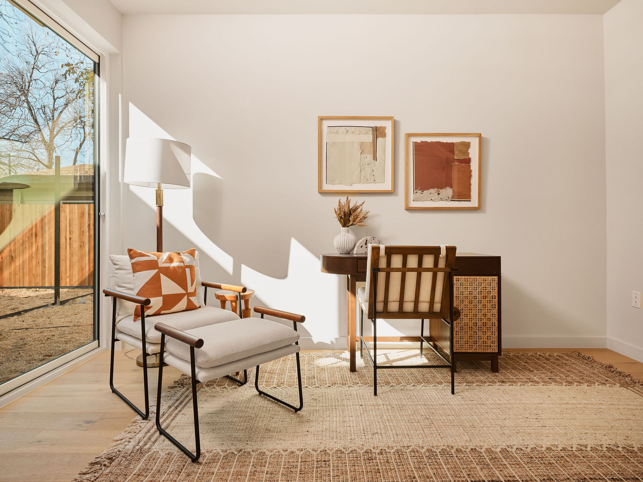 1404 Garden Street, Unit 2B Austin, TX 78702 - Photo 5 of 38 Living area featuring wood finished floors and baseboards