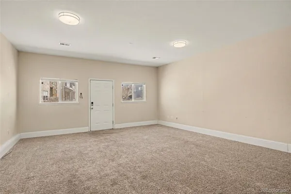 an empty room with windows
