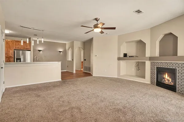 a view of a livingroom with a fireplace