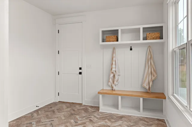 a view of room with window and stairs