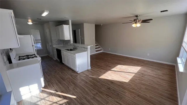a bathroom with a bathtub and a sink