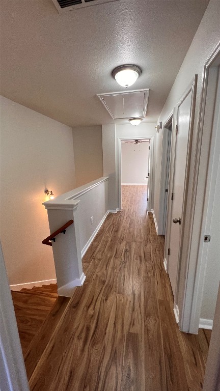 2865 Southampton Way, Unit B Round Rock, TX 78664 - Photo 6 of 9 a view of a room with wooden floor and white walls