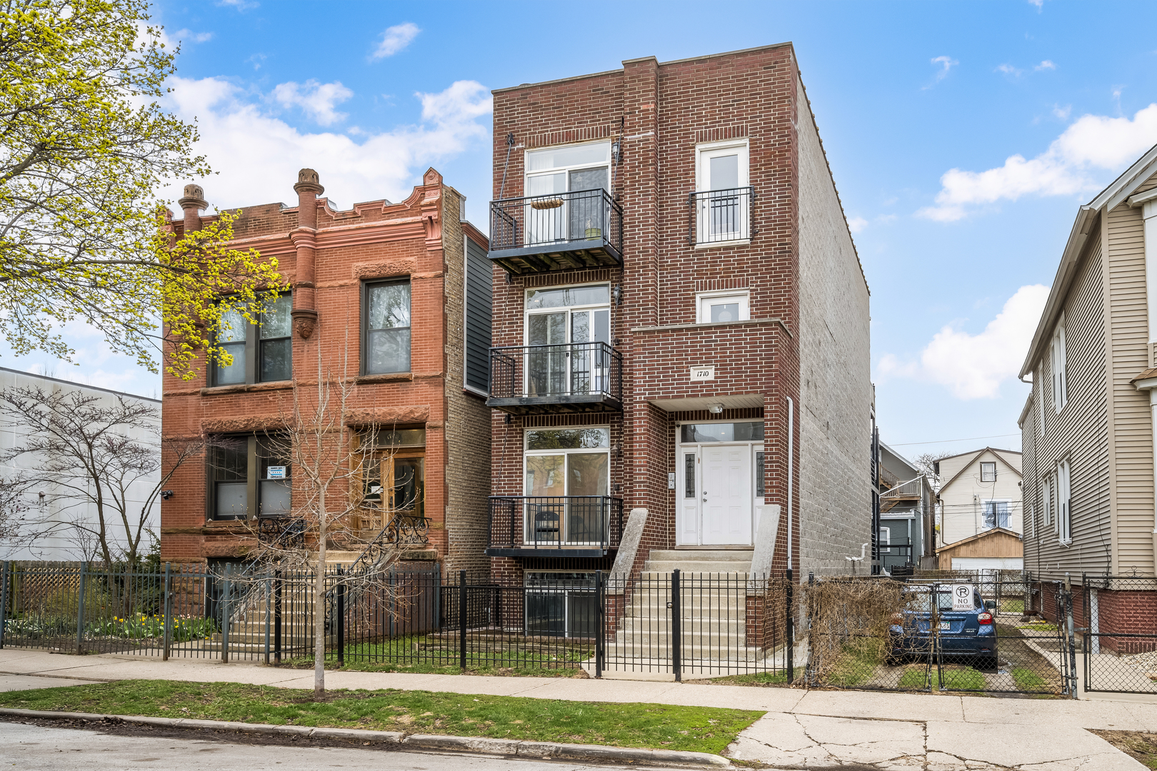 1710 North Whipple Street, Unit 3 Chicago, IL 60647 - Photo 1 of 17 a front view of a building with street view