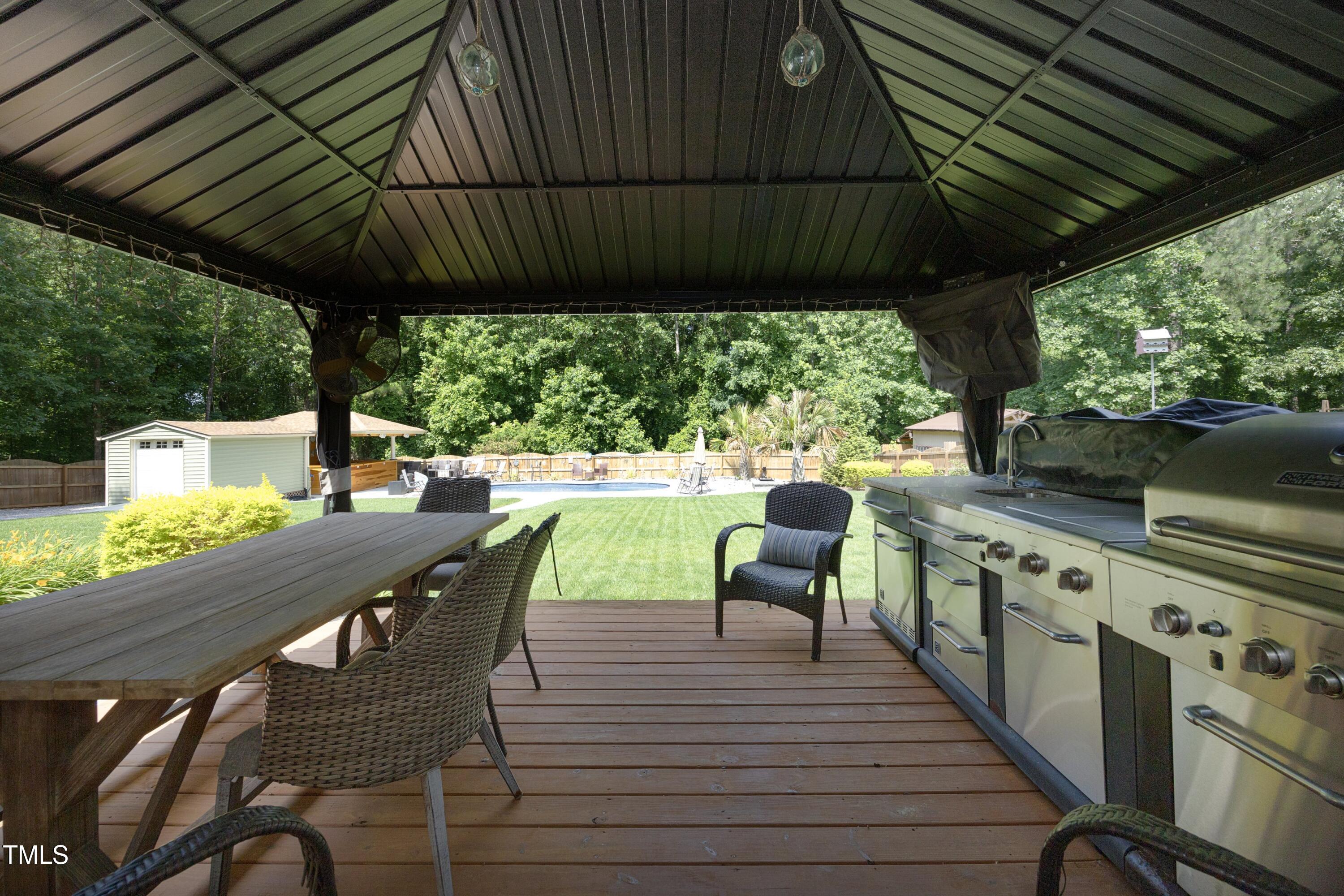 150 Churchill Road Louisburg, NC 27549 - Photo 18 of 50 18GrillDeck