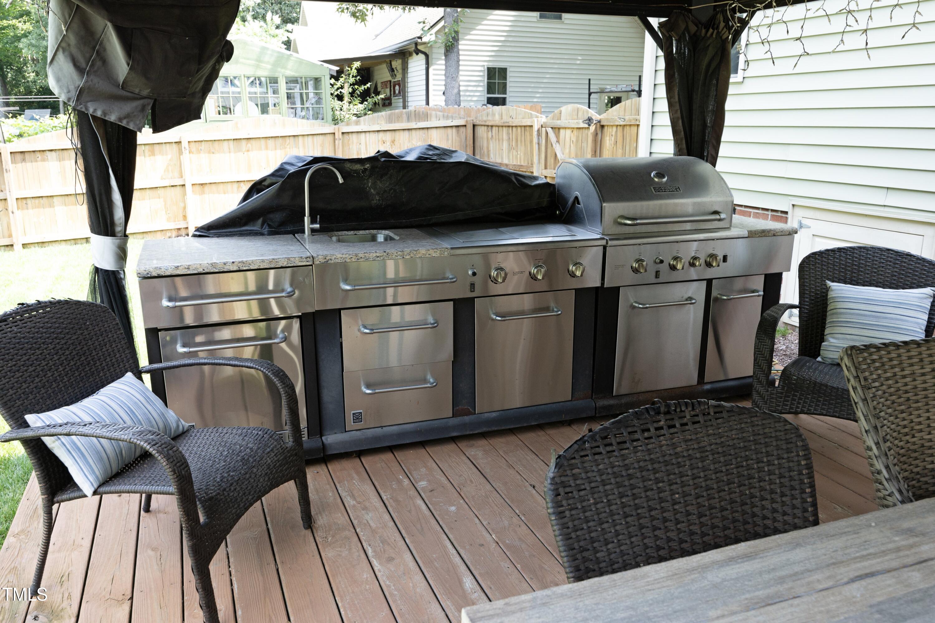 150 Churchill Road Louisburg, NC 27549 - Photo 19 of 50 19OutdoorKitchen