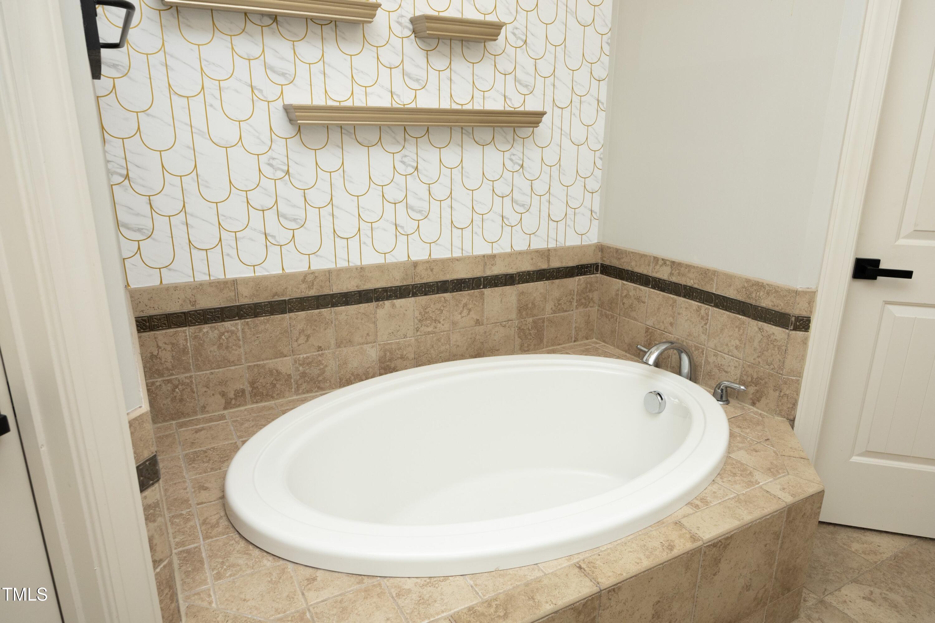 150 Churchill Road Louisburg, NC 27549 - Photo 37 of 50 37SoakingTub