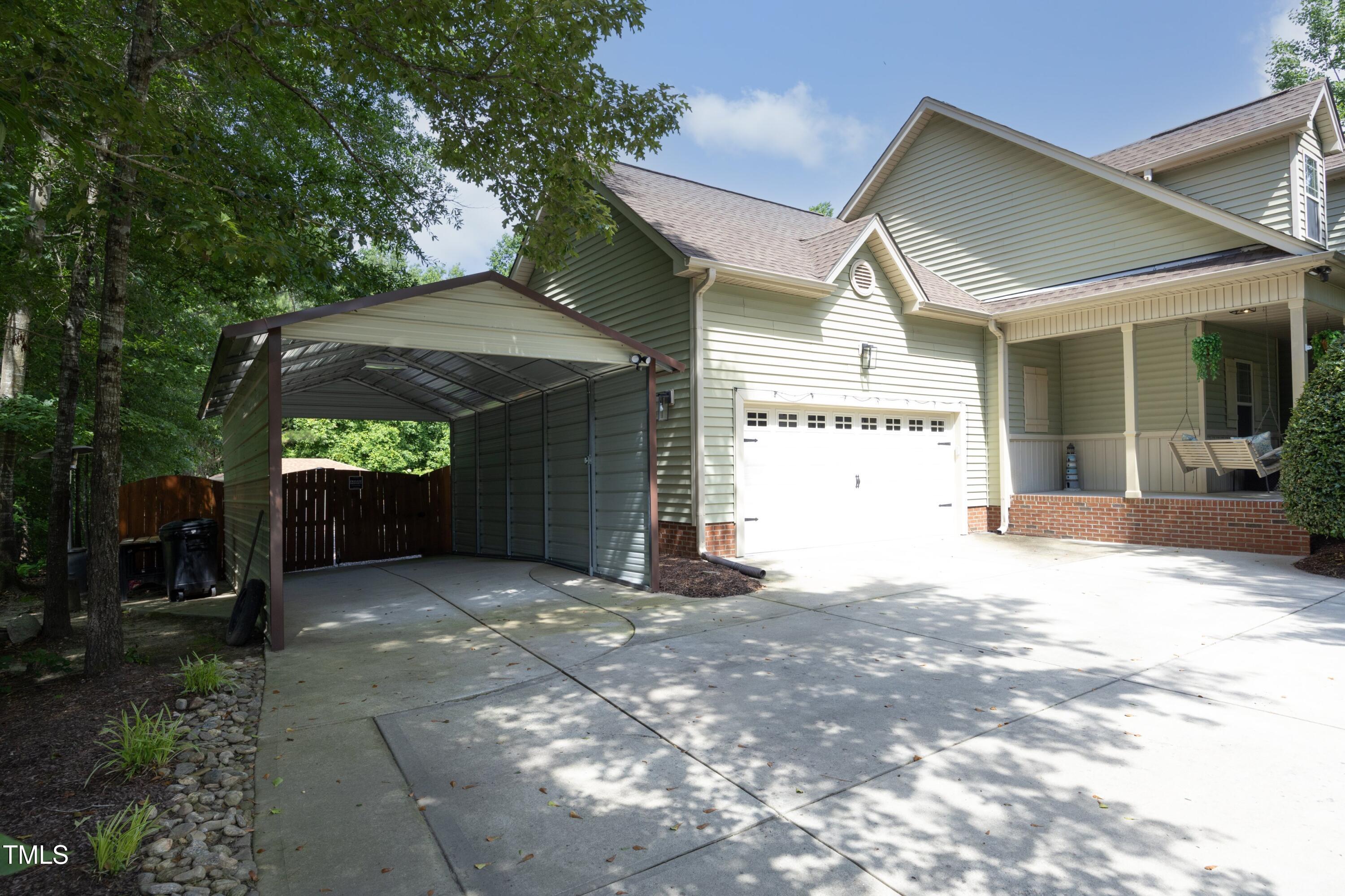 150 Churchill Road Louisburg, NC 27549 - Photo 5 of 50 05Garage_Carport