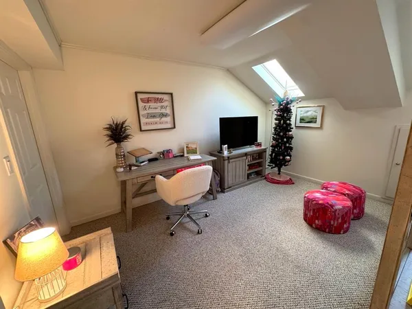 a bedroom with furniture and a couch