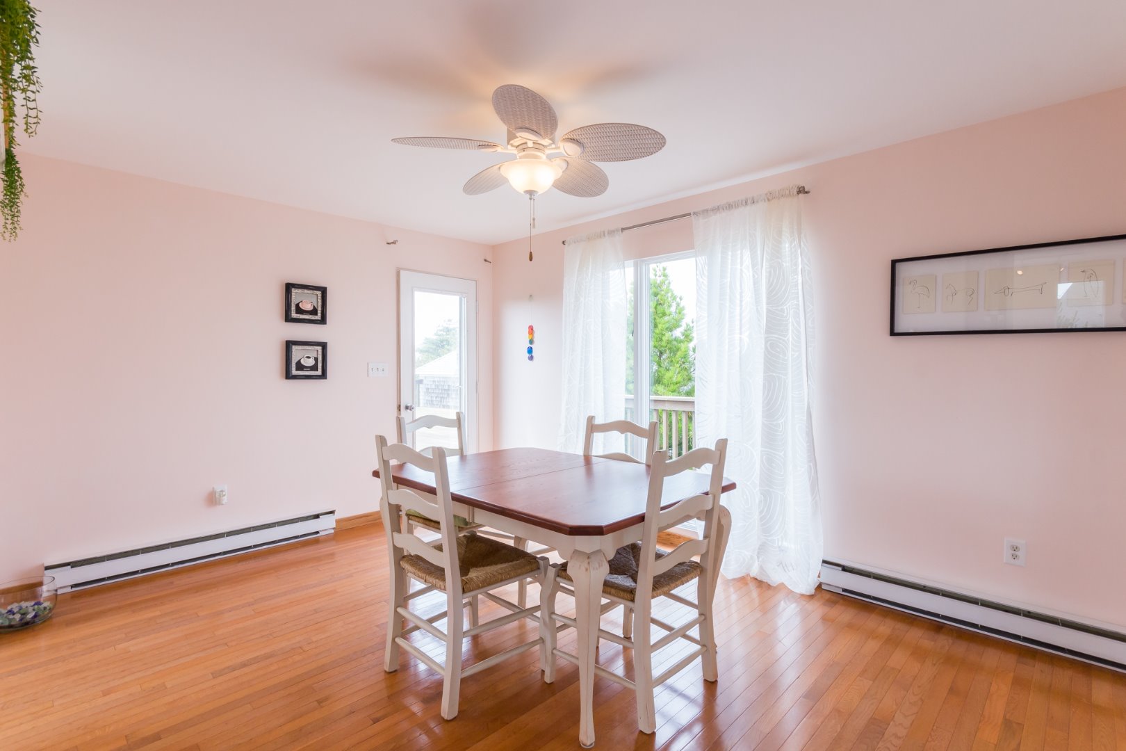 4 Katama Farm Road Edgartown, MA 02539 - Photo 23 of 40 The dining room has sliders and a door to the deck.