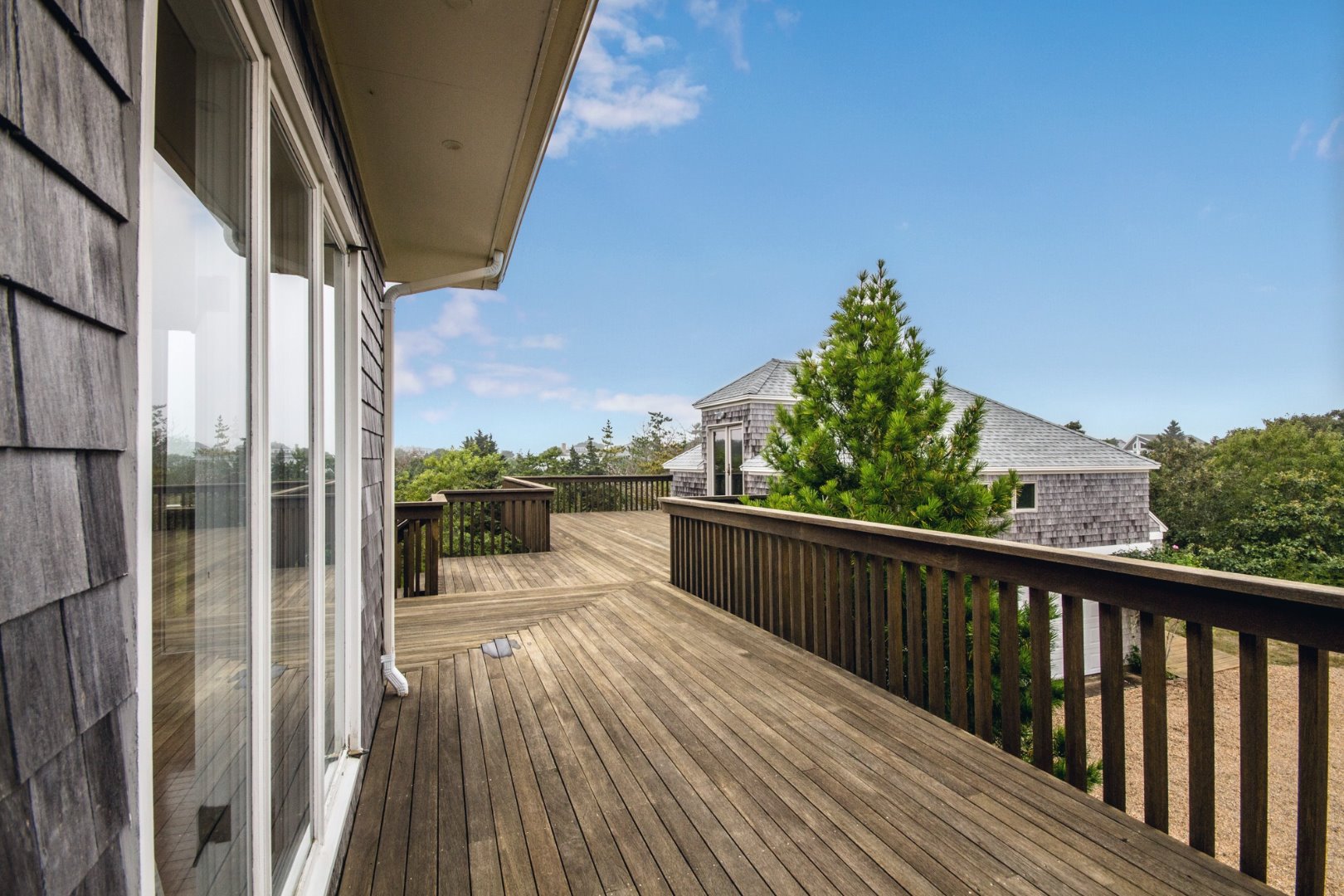 4 Katama Farm Road Edgartown, MA 02539 - Photo 31 of 40 The never ending wrap around deck for outdoor entertaining.