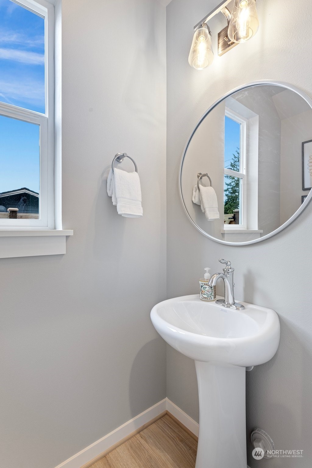 116 161st Street Southeast, Unit 1 Bothell, WA 98012 - Photo 17 of 37 a bathroom with a sink and a mirror