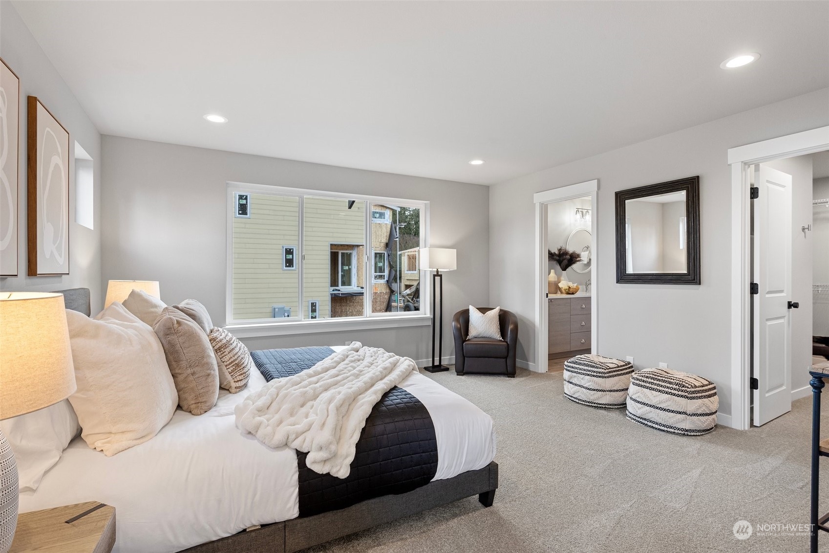 116 161st Street Southeast, Unit 1 Bothell, WA 98012 - Photo 18 of 37 a bedroom with a bed and a couch