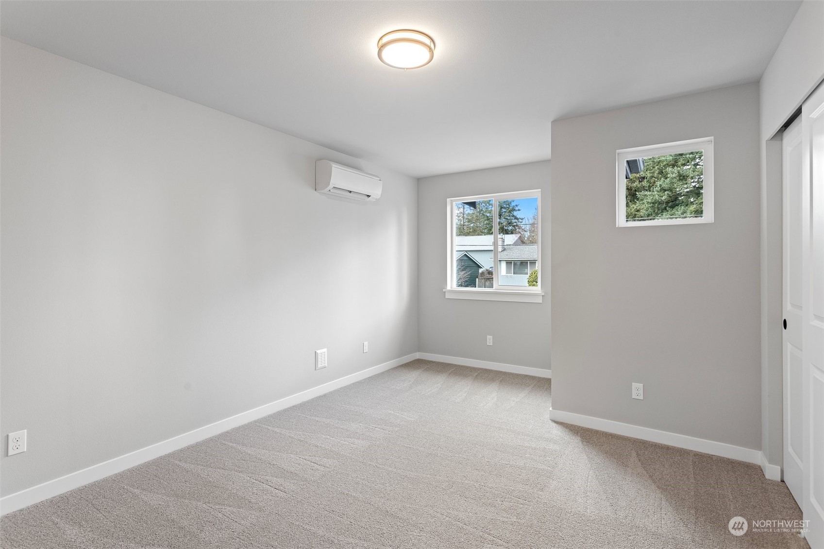 116 161st Street Southeast, Unit 1 Bothell, WA 98012 - Photo 27 of 37 an empty room with windows