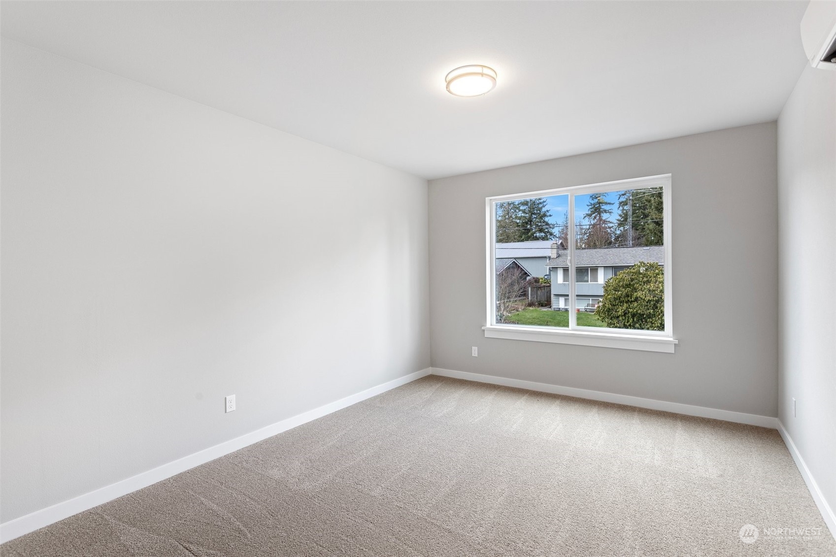 116 161st Street Southeast, Unit 1 Bothell, WA 98012 - Photo 29 of 37 an empty room with windows